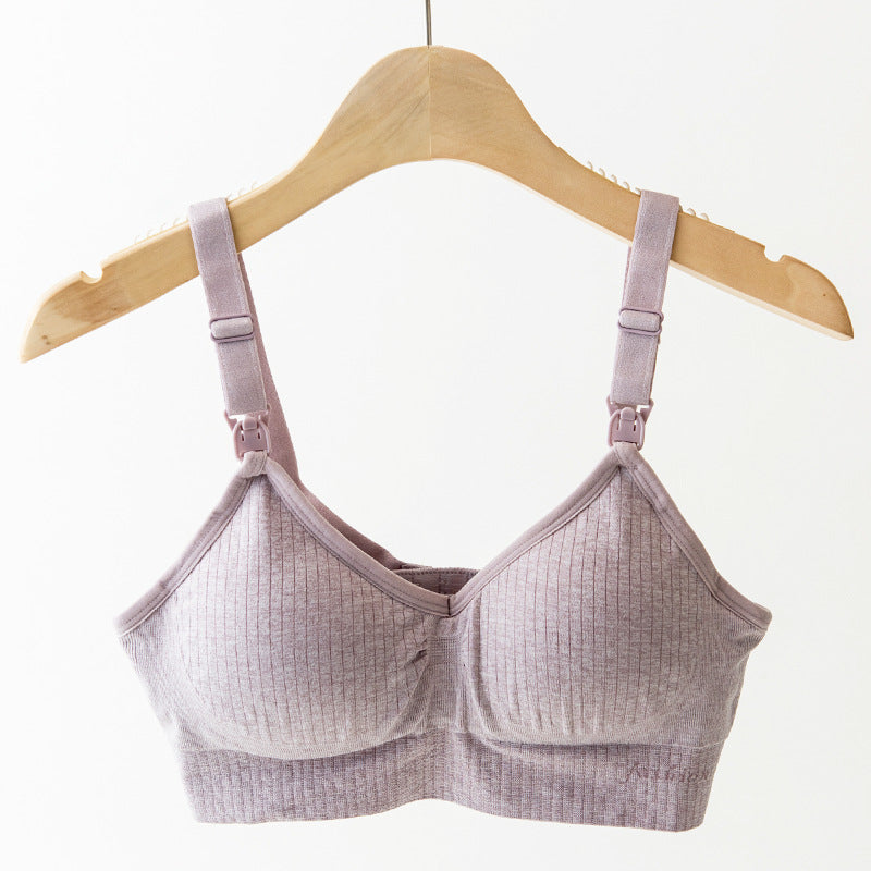 Soft lavender ribbed wireless nursing bra with adjustable straps and clips.