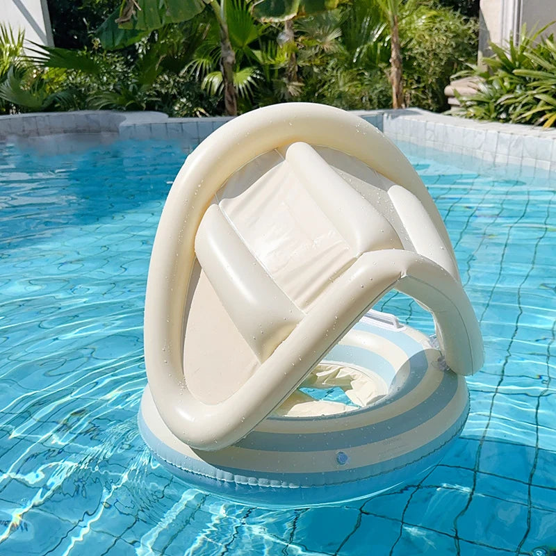 Inflatable baby swim float with sun canopy, light blue and white striped base, in a pool.