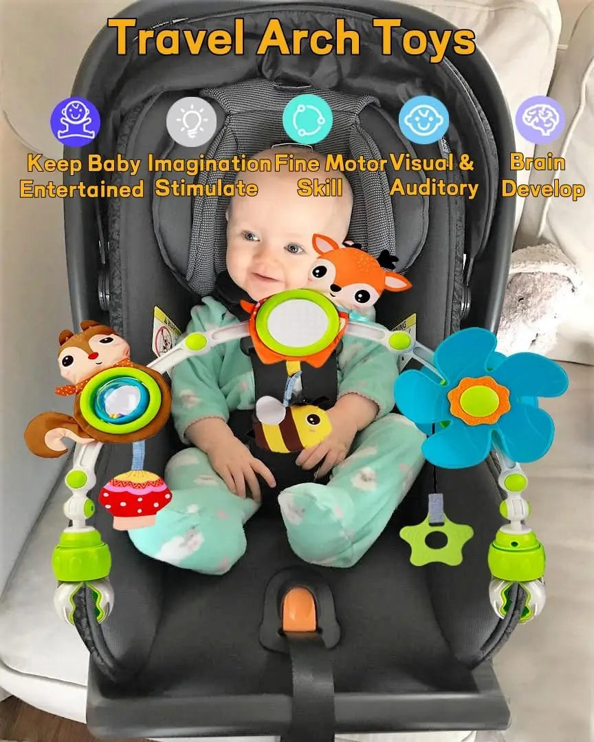 Baby travel arch with colorful hanging toys: fox, squirrel, flower, and mirror, attached to a car seat.