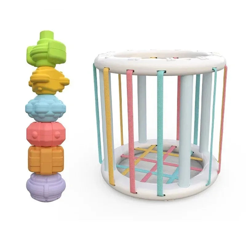 Montessori shape sorting cube with colorful elastic bands and textured stacking shapes for toddlers.