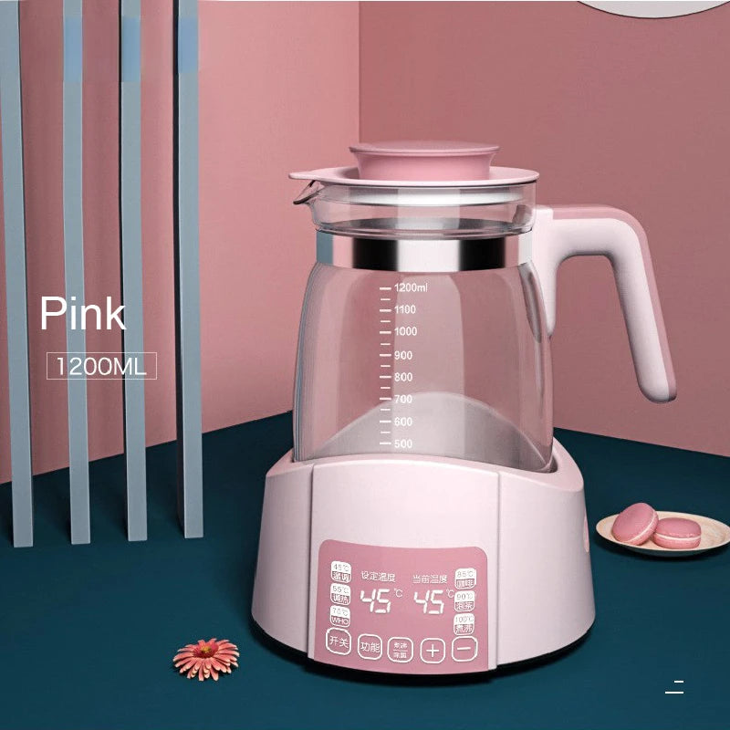 Pink 1.2L smart thermostat kettle for baby milk, with glass carafe, digital display, and pink base.