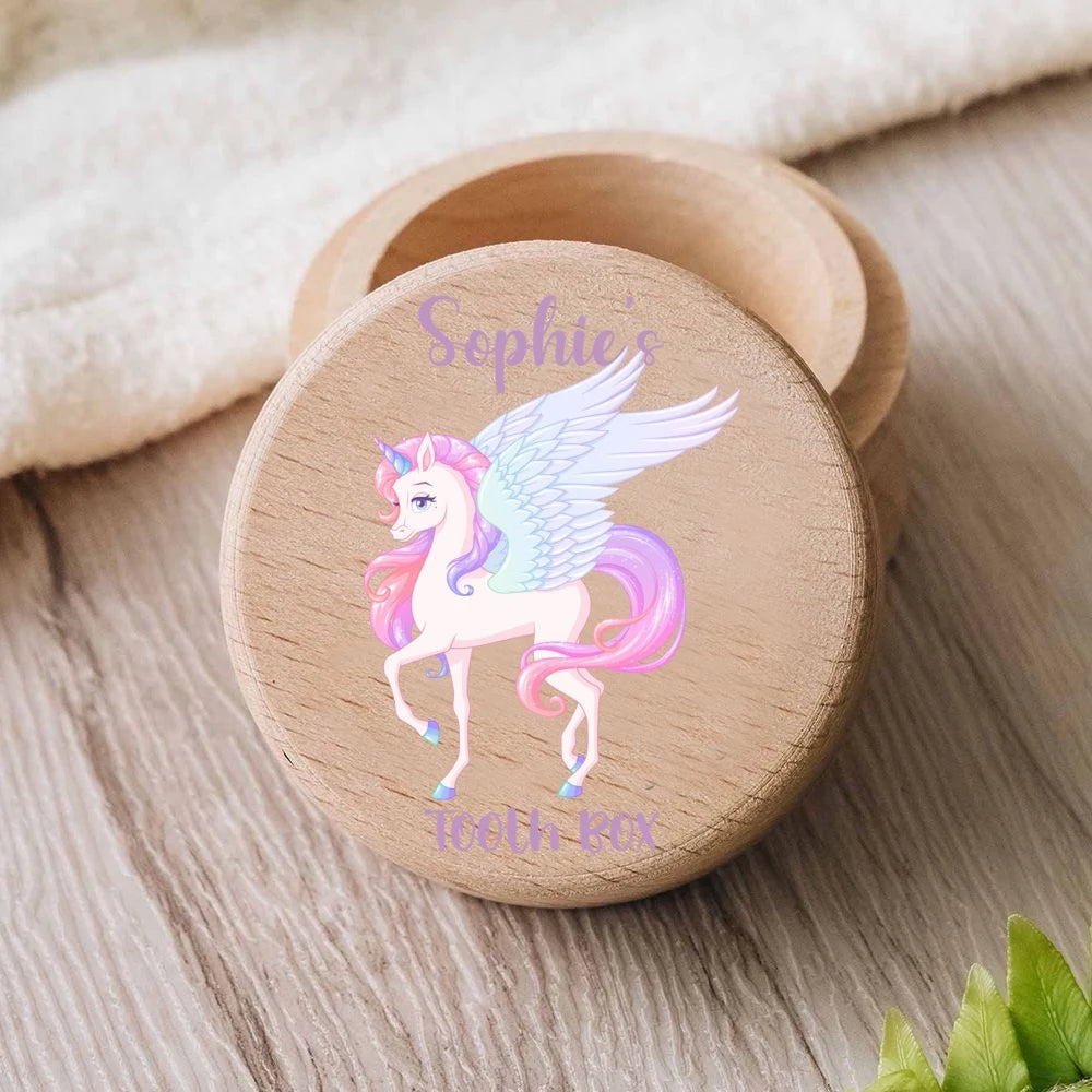 Personalized wooden tooth box with a colorful unicorn design and "Sophie's Tooth Box" engraving.