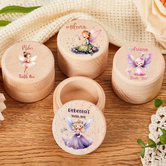 Personalized wooden tooth fairy boxes with custom names and fairy designs.