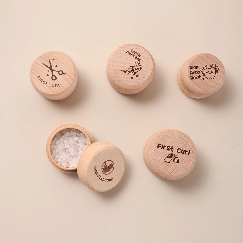 Six small round natural beech wood keepsake boxes for baby's first tooth, curl, and umbilical cord.
