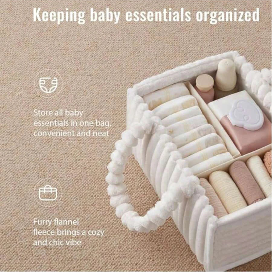Soft white flannel diaper caddy with multiple compartments, holding baby essentials on a beige carpet.