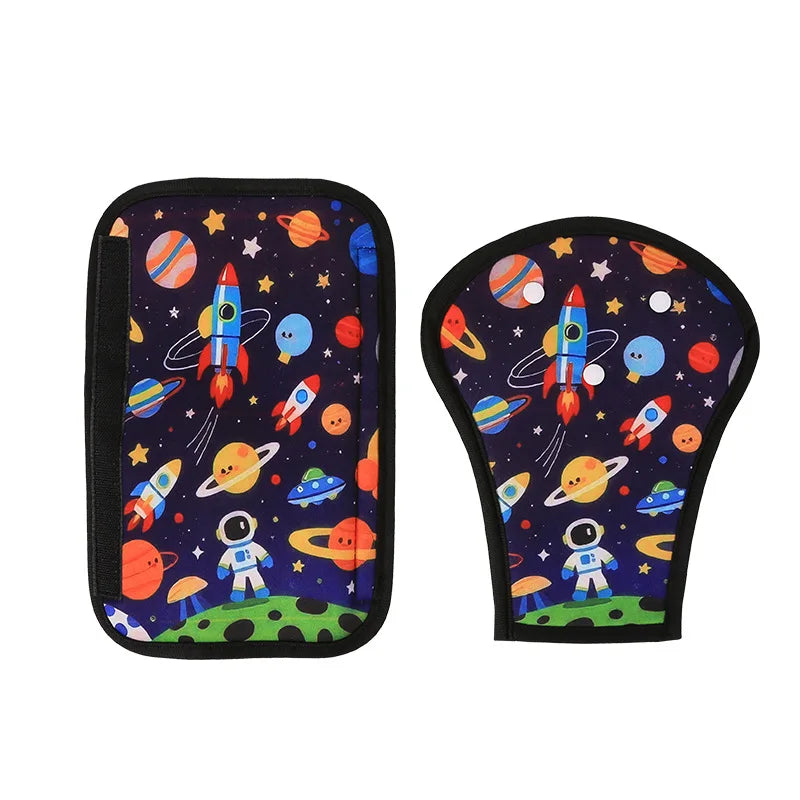 Kids' car seat belt adjuster and shoulder pad with colorful space-themed design.