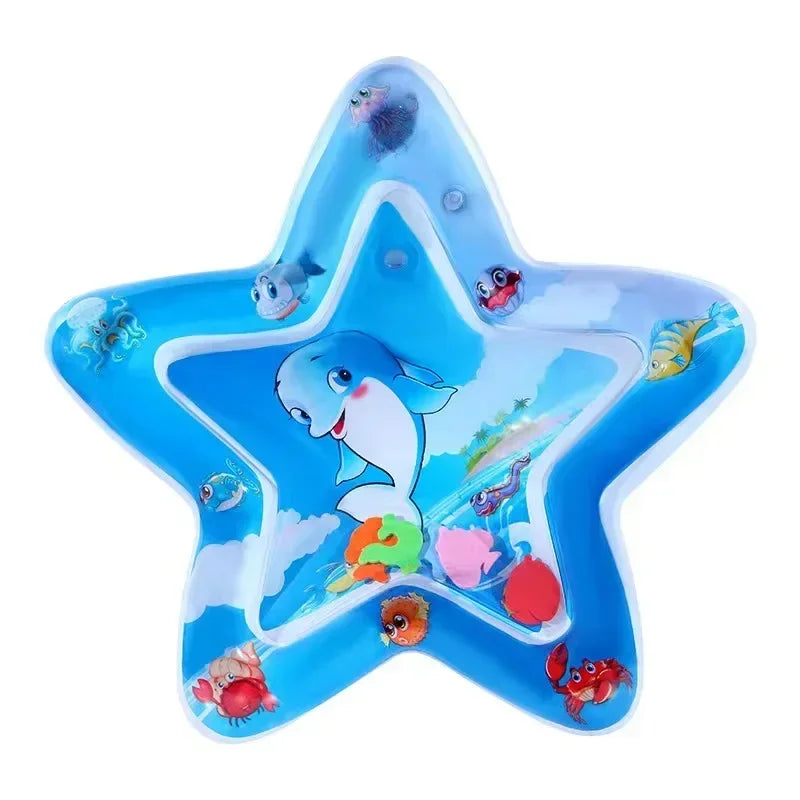 Blue star-shaped inflatable baby water play mat with floating sea creatures and a smiling dolphin.