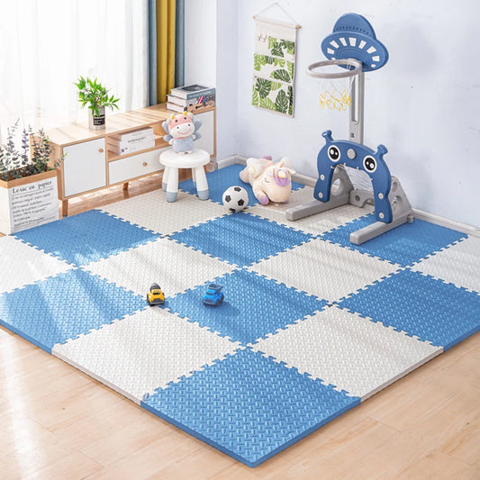 Blue and white checkered foam puzzle play mat for babies, 1cm thick, in a child's room.