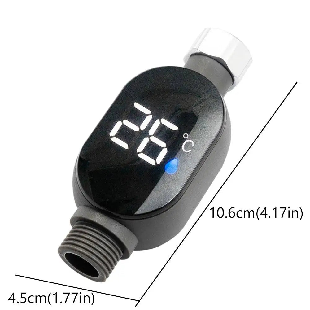 Black digital shower thermometer with LED display showing 26°C, 10.6cm long, 4.5cm wide.