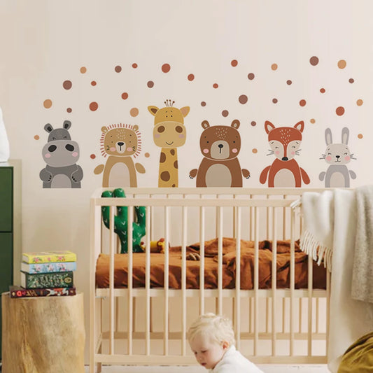 Boho animal wall decals with a hippo, lion, giraffe, bear, fox, and bunny, plus brown polka dots, above a crib.