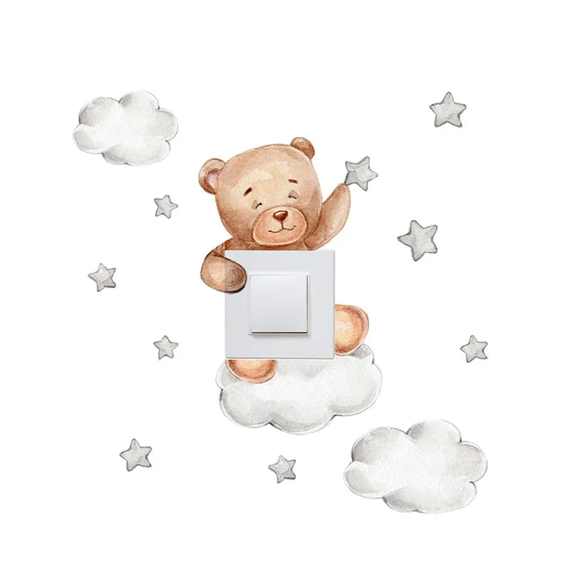 Cute brown teddy bear wall decal holding a light switch, surrounded by white clouds and gray stars.