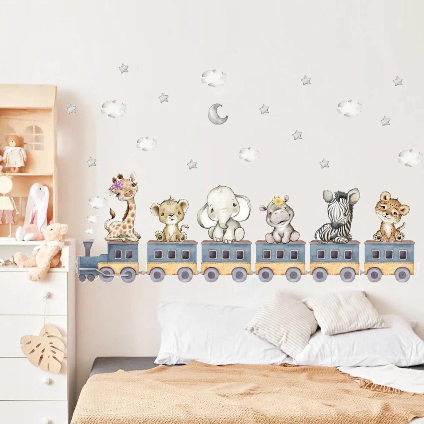 Watercolor safari animal train wall decals with clouds and stars for a baby's room.