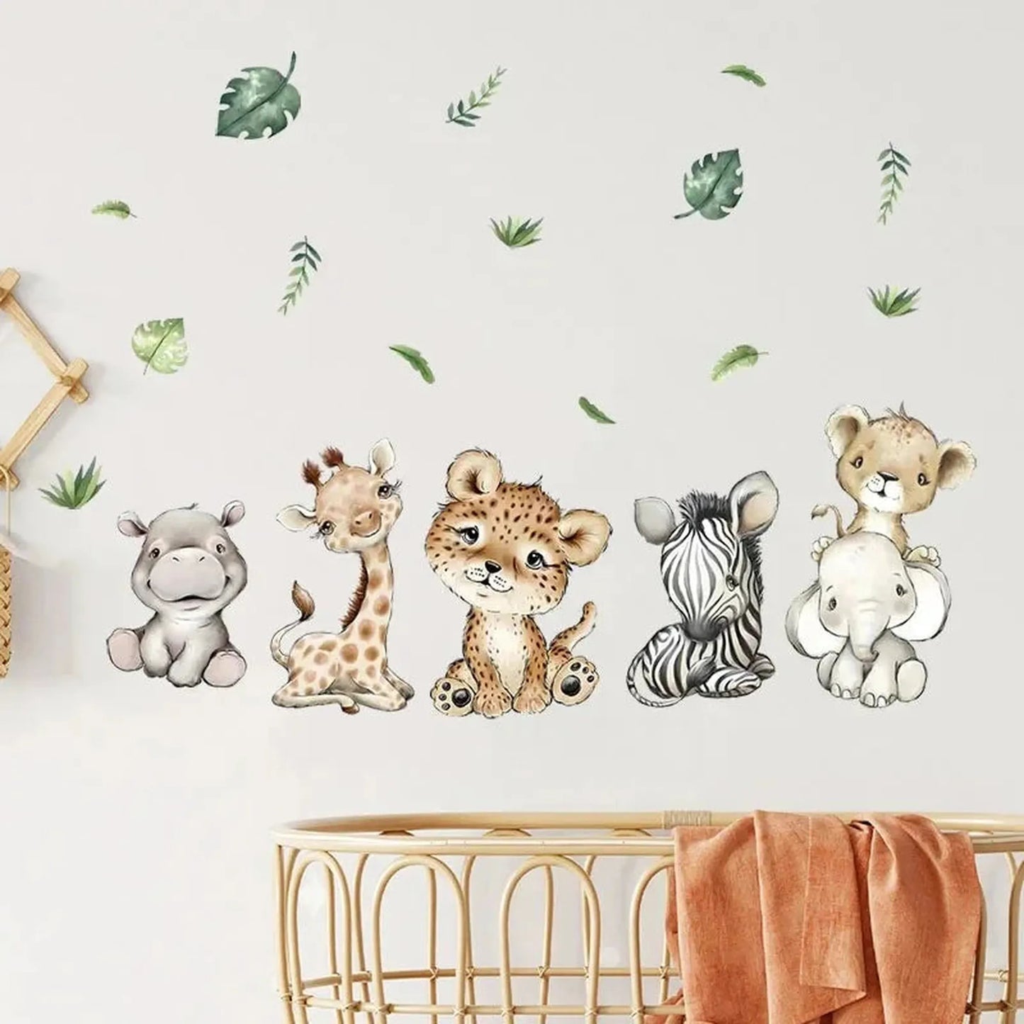 Cute watercolor jungle animal wall decals for nursery: hippo, giraffe, leopard, zebra, lion, and elephant with green leaves.