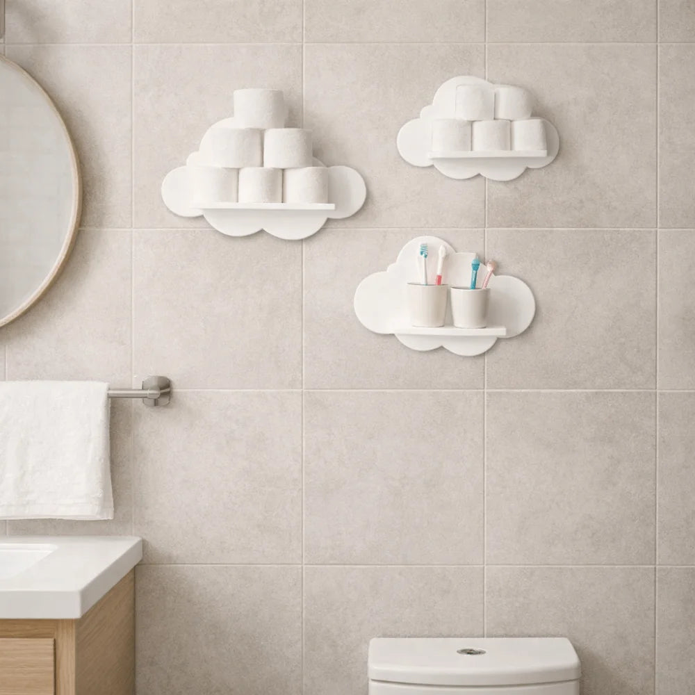 White wooden cloud-shaped wall shelves, 25x20cm, holding toilet paper and toothbrushes in a bathroom.