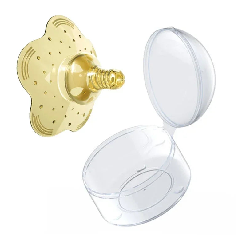 Soft yellow silicone nipple shield with a clear protective case for comfortable breastfeeding.