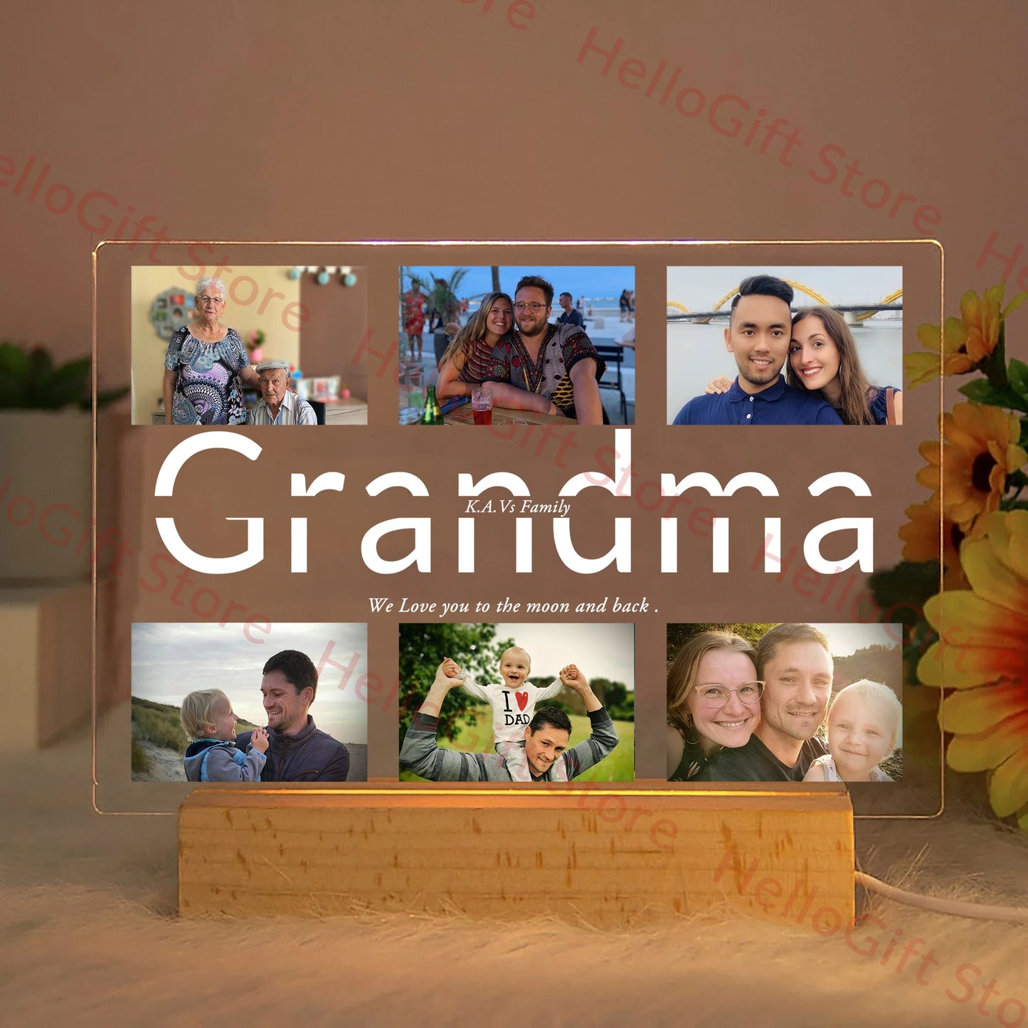 Personalized acrylic LED night light with "Grandma" text, multiple family photos, and a wooden base.