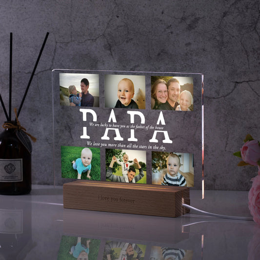 Personalized acrylic night light with "PAPA" text, multiple family photos, and a wooden LED base.