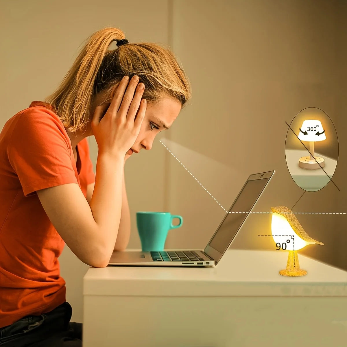 Woman using a laptop with a glowing bird-shaped LED night light on a desk.