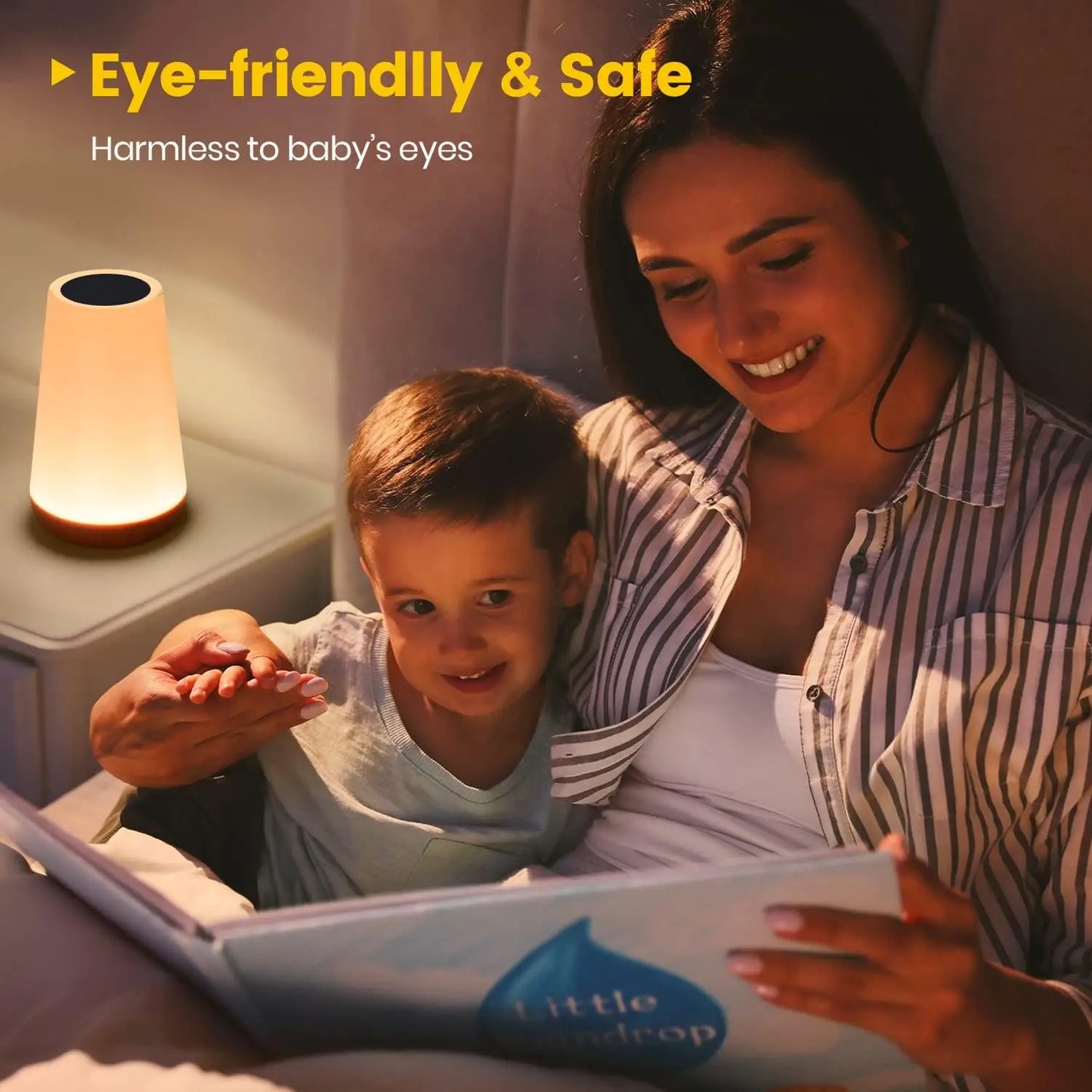 Mother and child reading a book with a glowing, white and wood smart RGB night light on a bedside table.