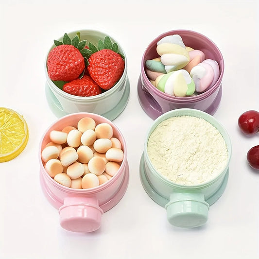 Four colorful, stackable baby food containers in pink, purple, and mint green, filled with snacks.