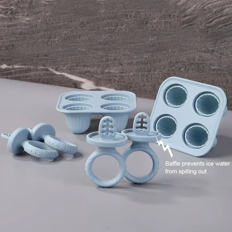 Light blue silicone baby fruit and vegetable teethers with rabbit design, plus ice pop molds.