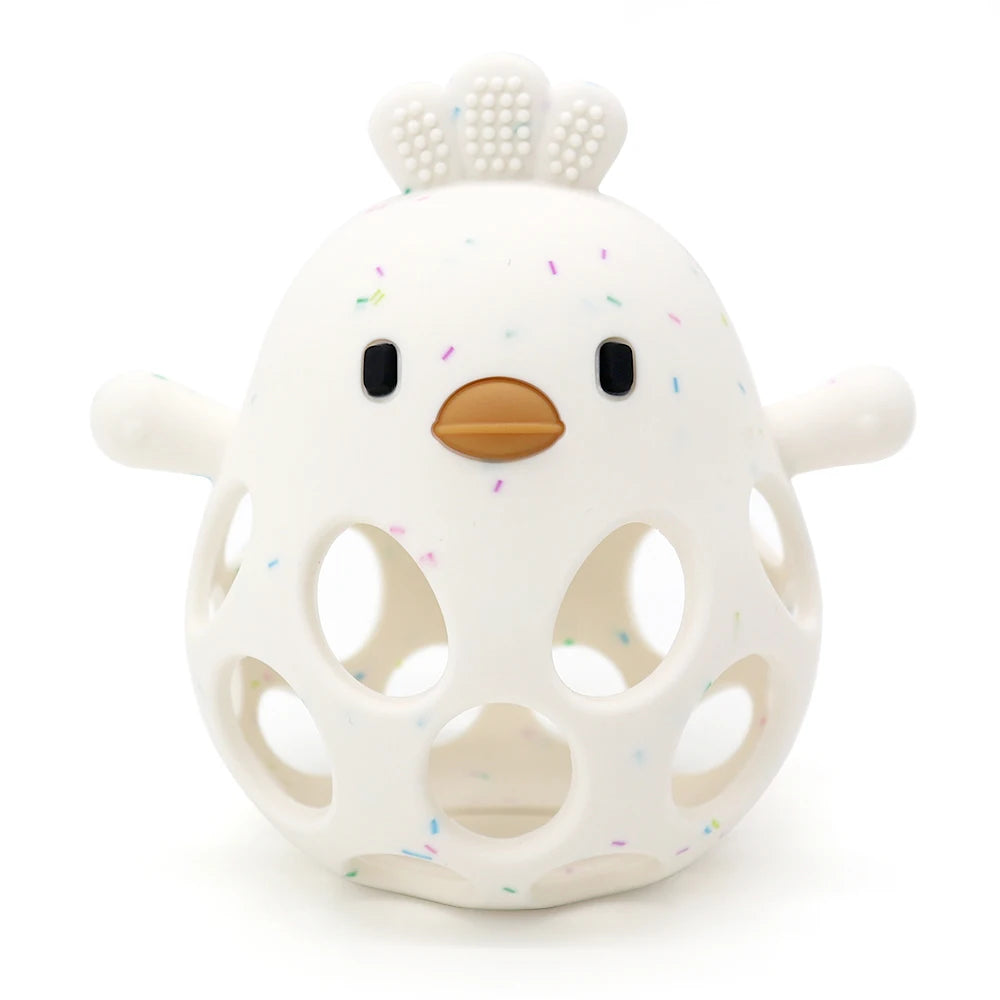 White silicone chick baby teether with colorful sprinkles, hollow design, and soft texture.