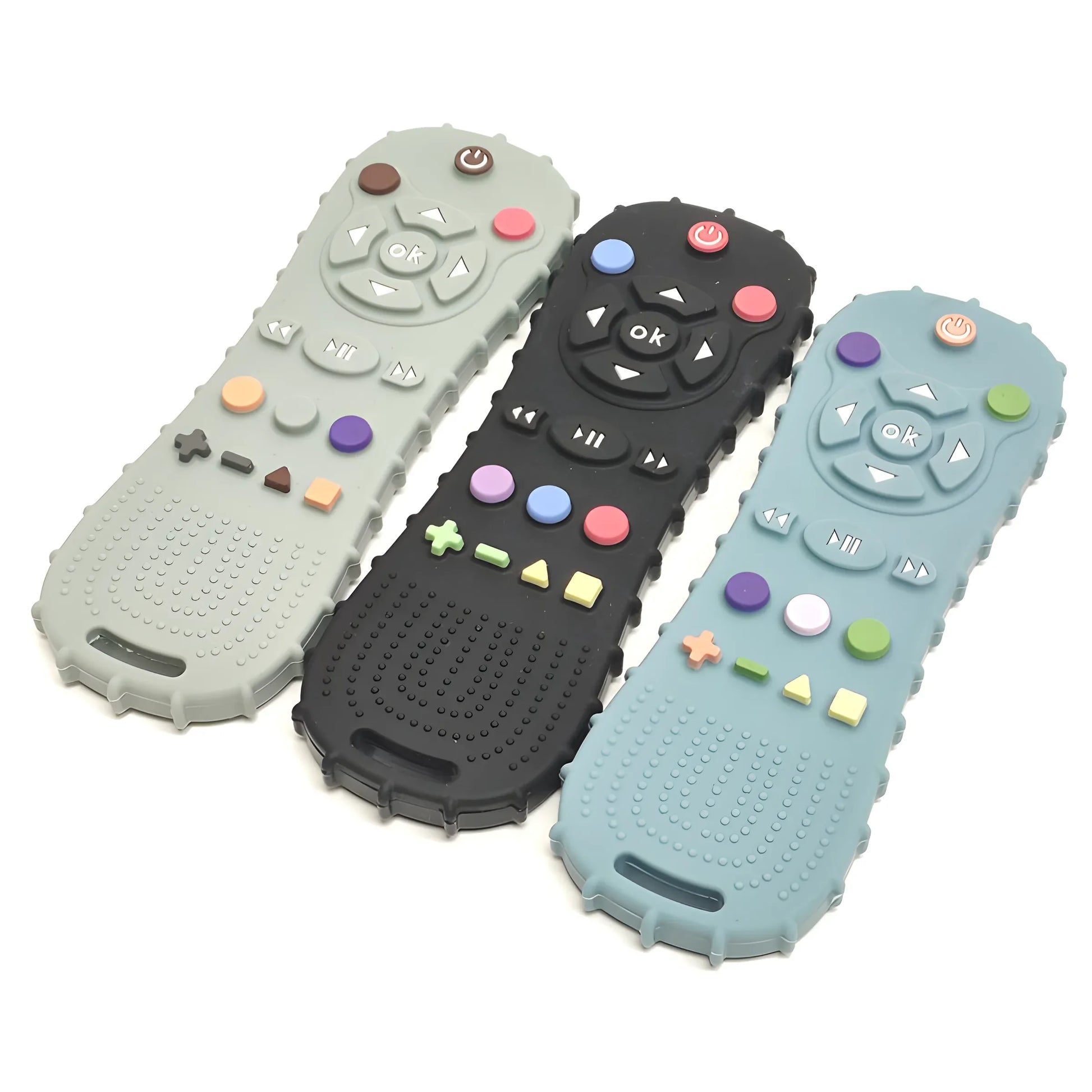 Three silicone baby teethers shaped like remote controls in gray, black, and blue with colorful buttons.