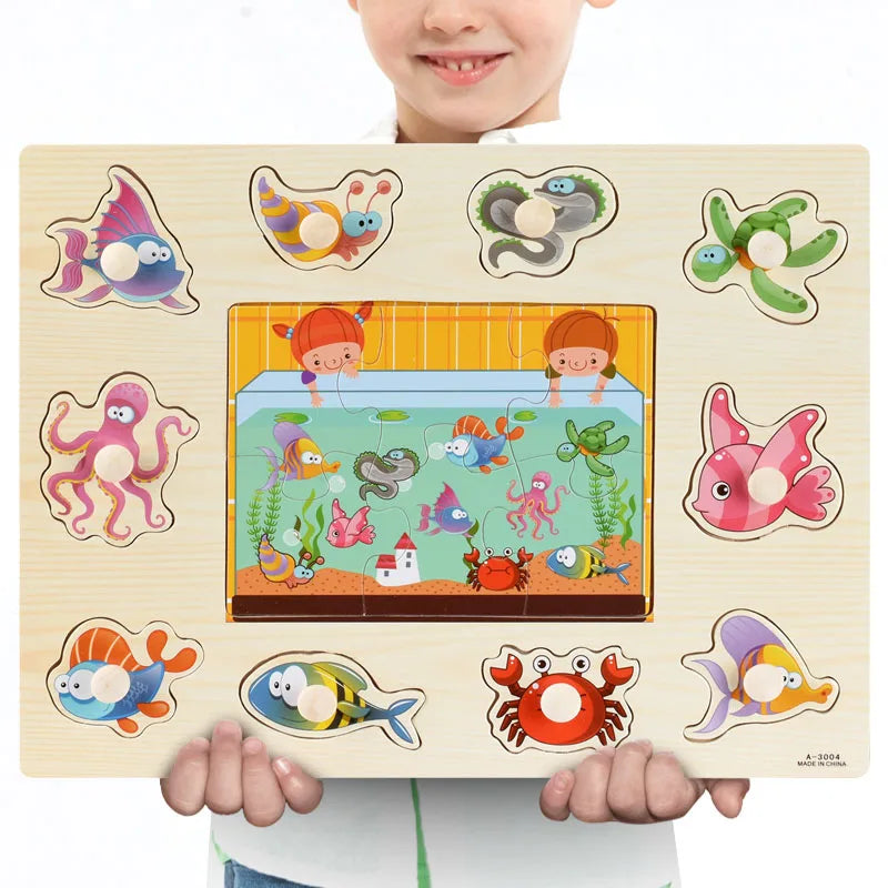Wooden Montessori puzzle with colorful sea creatures and an aquarium scene.
