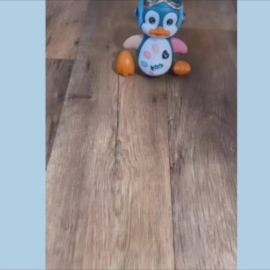 צעצוע פינגווין מוזיקלי זוחל אינטראקטיבי לפיתוח מיומנויות תינוקות עם אורות