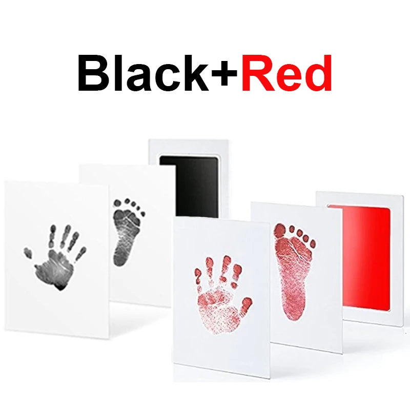 Black and red no-ink baby handprint and footprint kits with white cards, showing clear impressions.