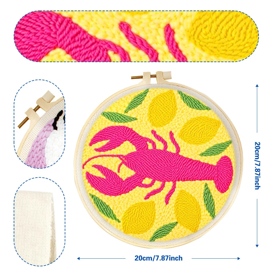 Punch needle embroidery kit with pink lobster and yellow lemons on a 20cm hoop.
