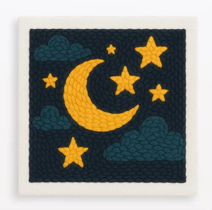Punch needle art kit with a yellow moon and stars on a dark blue background, framed in wood.
