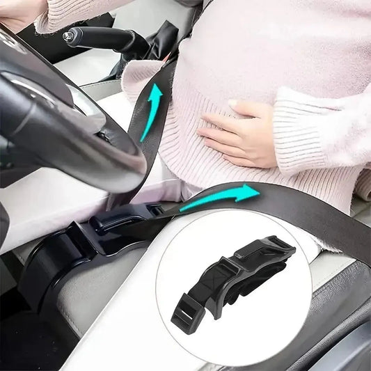 Pregnant woman using a black car seat belt adjuster for belly comfort, with a close-up of the device.