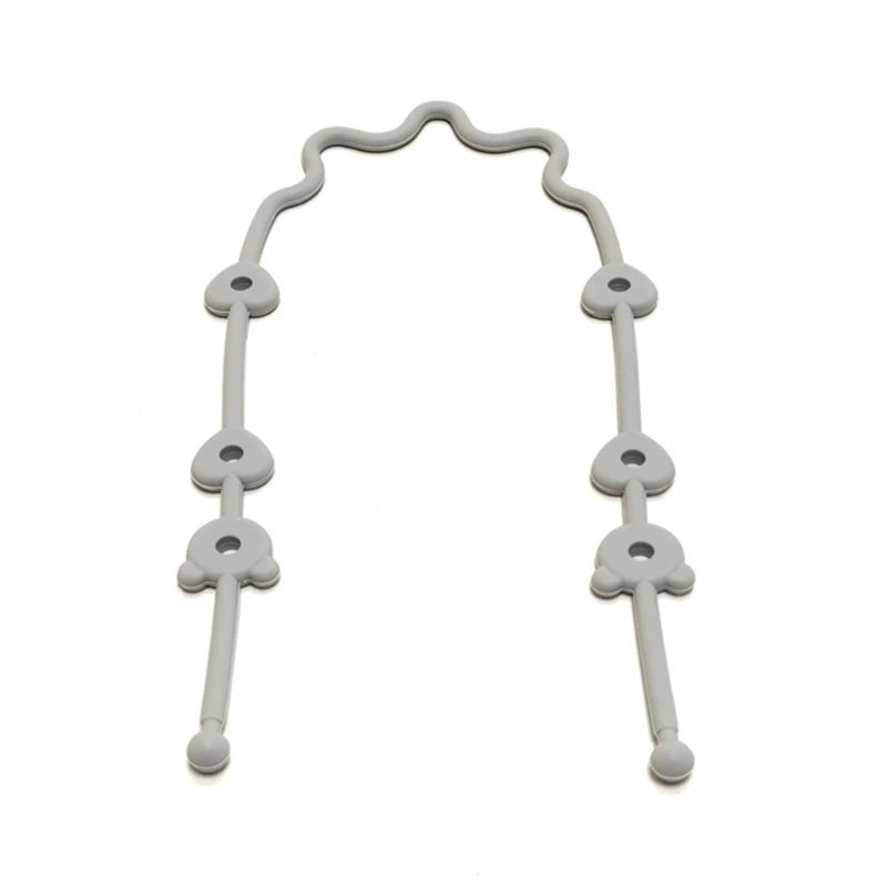 Adjustable gray silicone pacifier and bottle strap with heart-shaped connectors, preventing drops.
