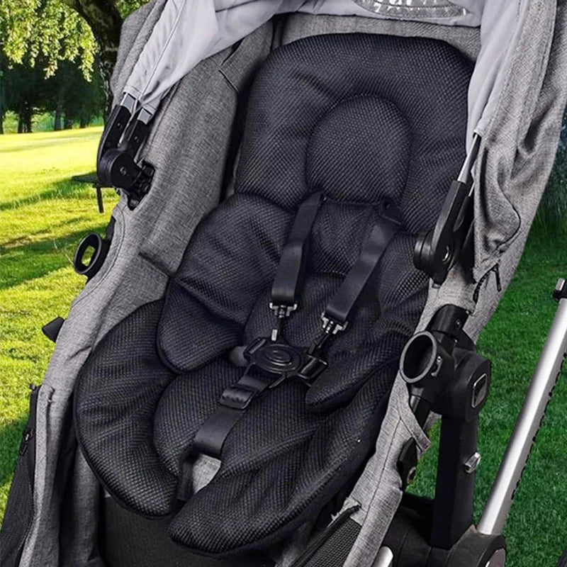Black universal reversible stroller and car seat liner with breathable mesh fabric.