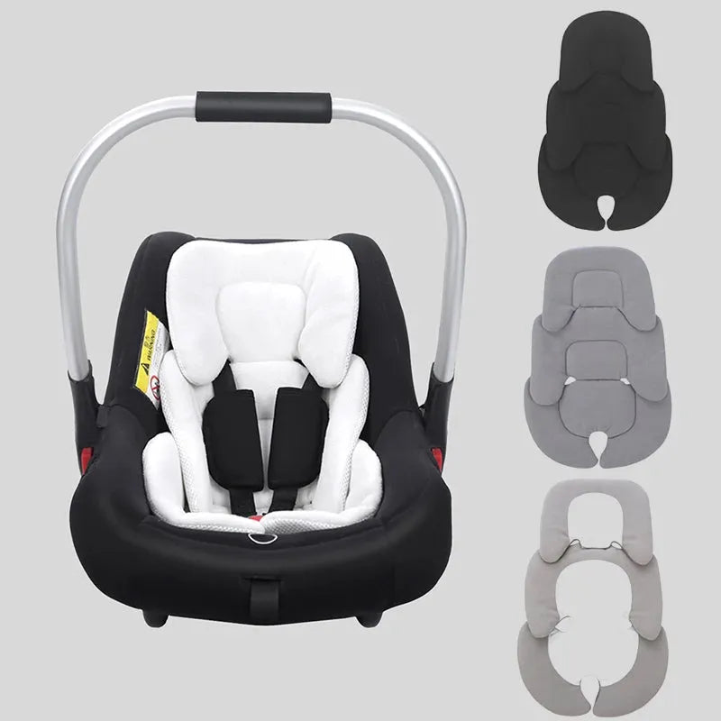 Black and white universal reversible baby stroller and car seat liner with head support, shown with gray options.