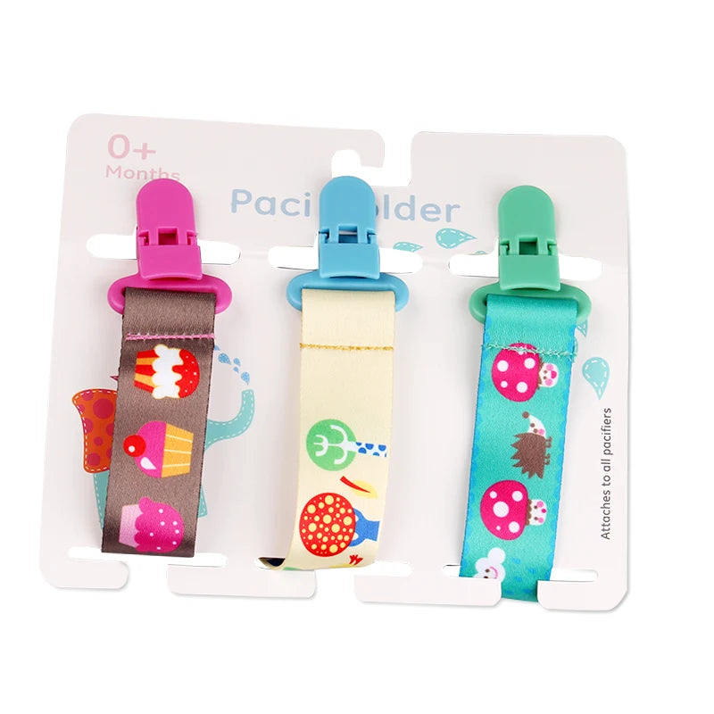 Set of 3 colorful polyester pacifier clips with plastic clasps and cute cartoon designs.