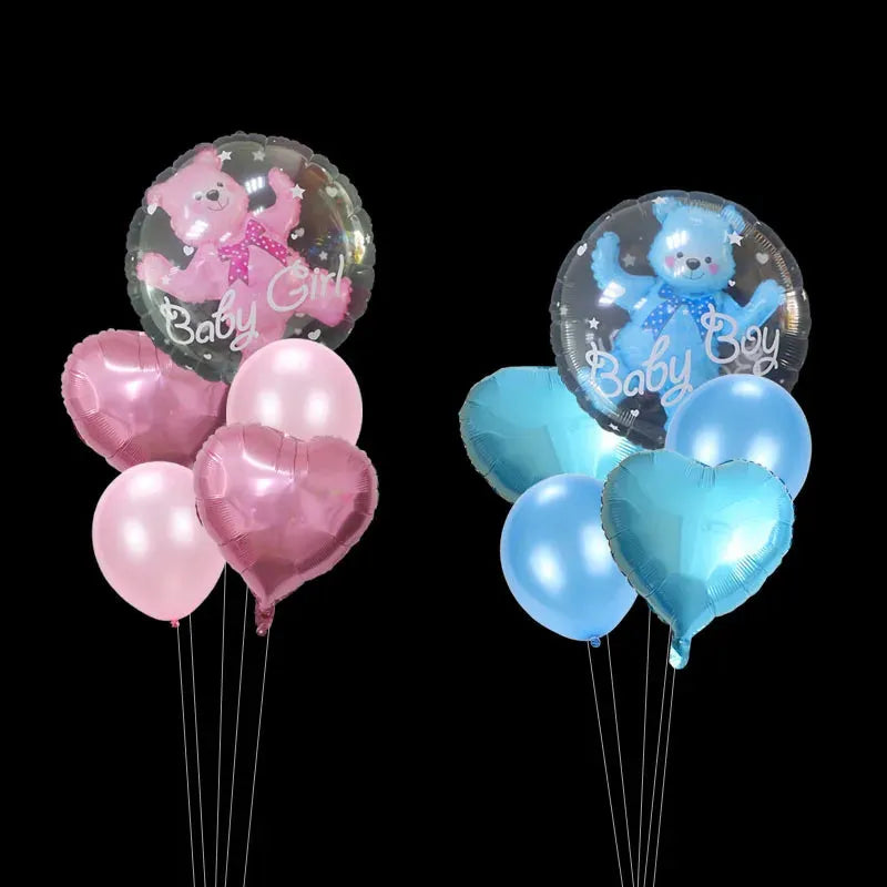 Pink and blue transparent bear balloons with heart and round foil balloons for baby showers.
