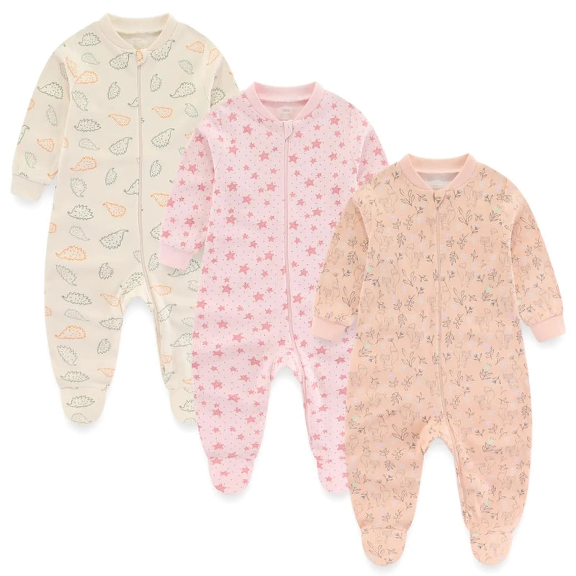 Three long-sleeve cotton baby rompers: cream with hedgehogs, pink with stars, and peach with floral patterns.