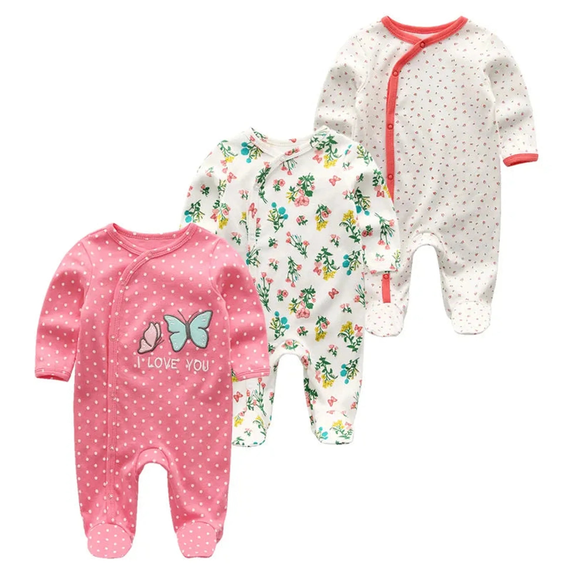 Three long-sleeve cotton baby rompers: pink with butterflies, white with floral print, and white with tiny red hearts.