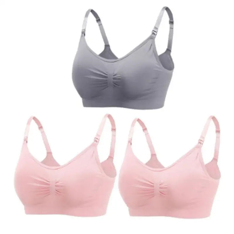 Set of 3 seamless, breathable nursing and maternity bras: one grey, two pink, with front clips.
