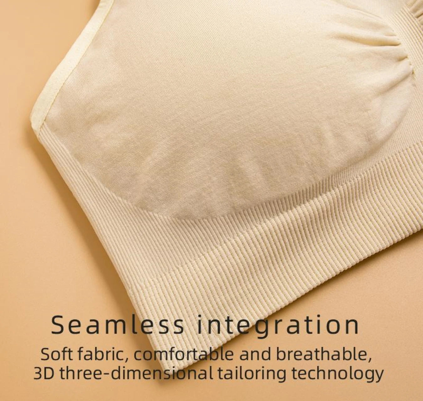 Close-up of a seamless, breathable beige maternity and nursing bra with ribbed details.