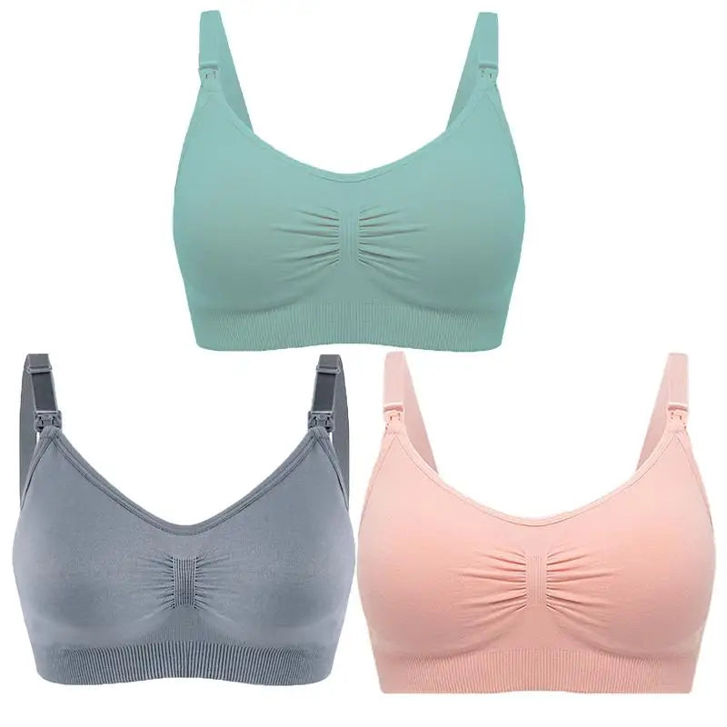 Set of 3 seamless, breathable nursing and maternity bras in mint, grey, and peach with front clips.
