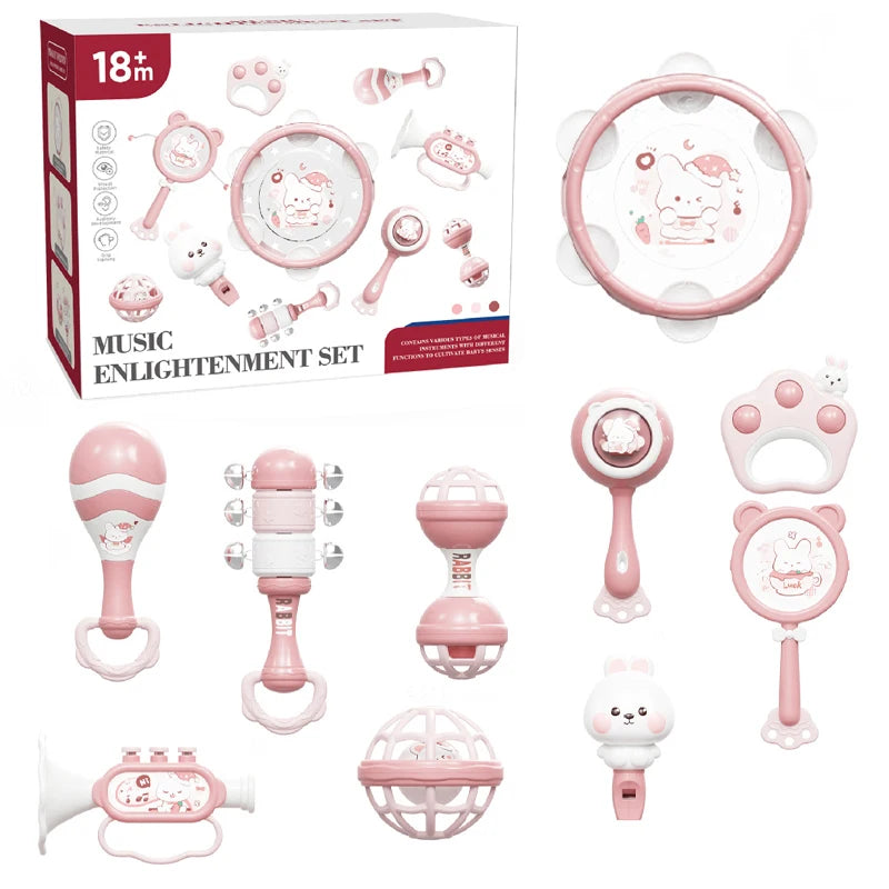 Pink Montessori musical rattle and teether set for babies, featuring various shapes like a tambourine, maraca, and animal designs.
