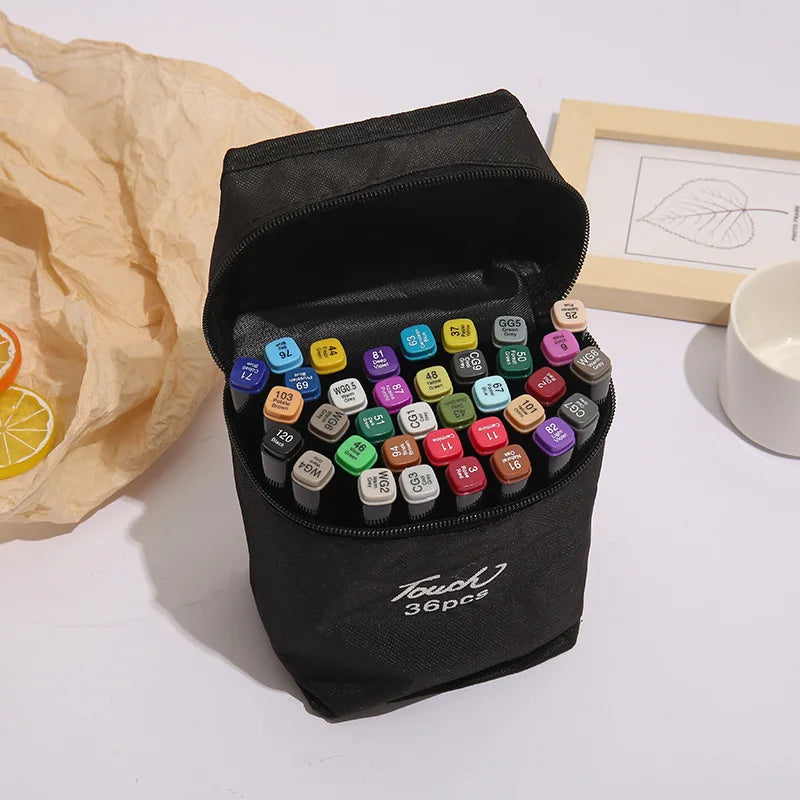 Black canvas case with 36 dual-tip professional art markers in assorted vibrant colors, open on a white surface.
