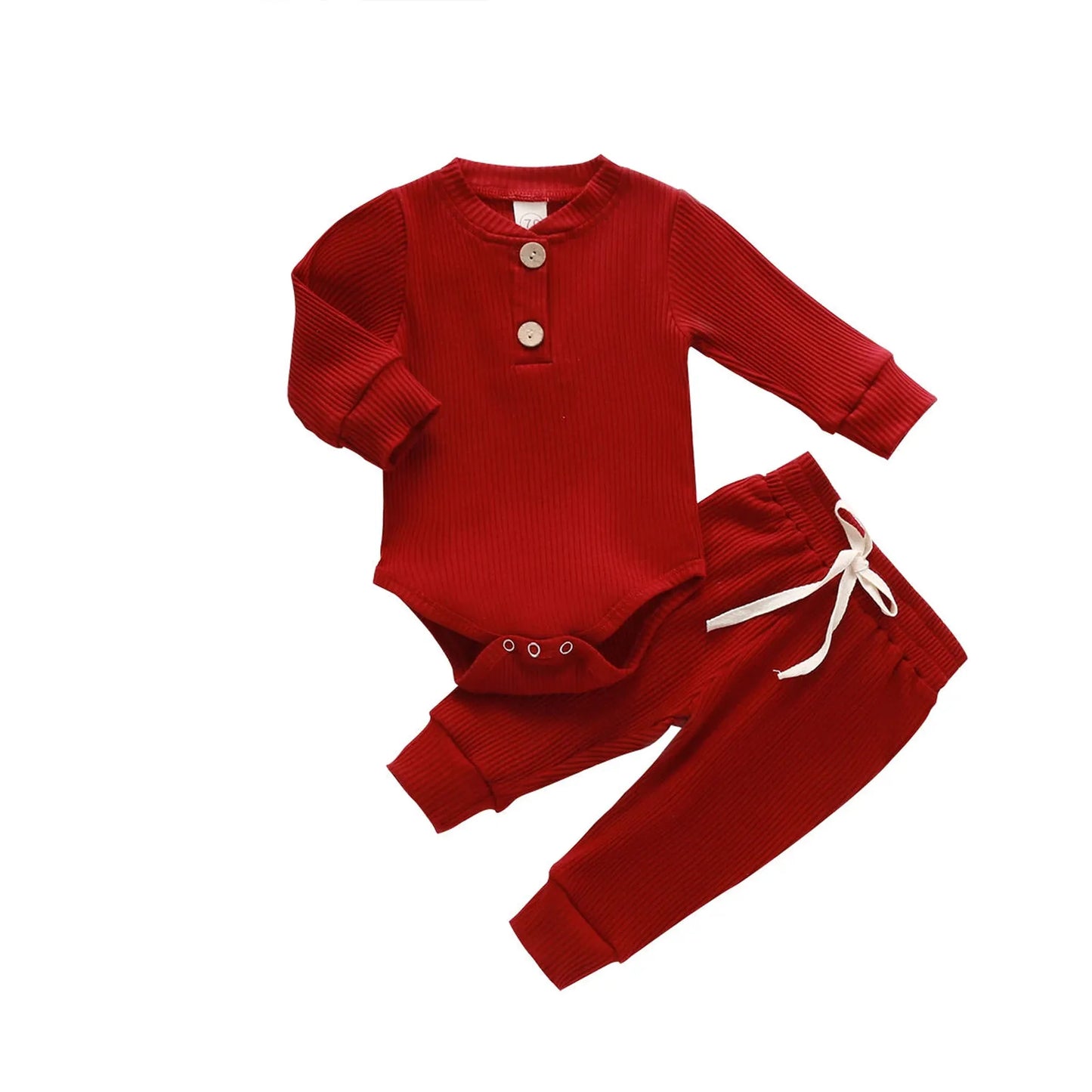 Red ribbed long-sleeve cotton baby bodysuit and matching pants with white drawstring.