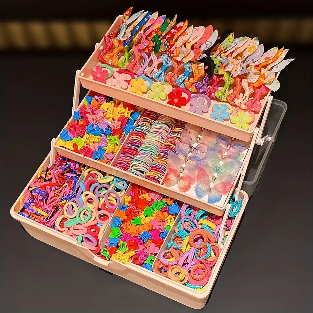 Colorful 555-piece butterfly hair clip and elastic band set for girls in a pink tiered organizer.