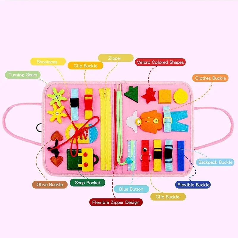 Pink felt Montessori busy board for kids with shoelaces, zippers, buckles, and colorful shapes.