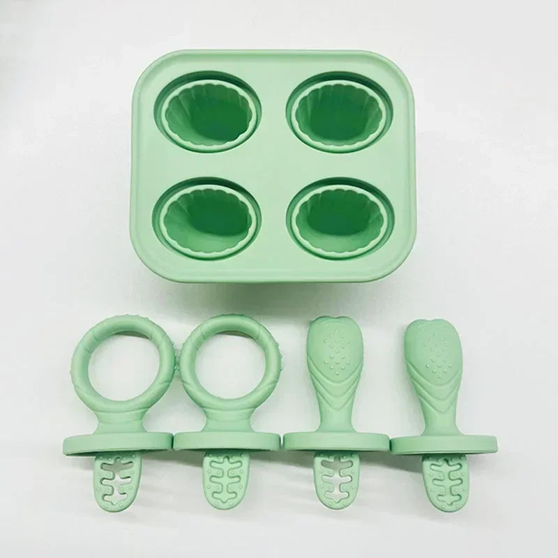 Green silicone reusable baby popsicle mold with 4 cavities and 4 matching handles.