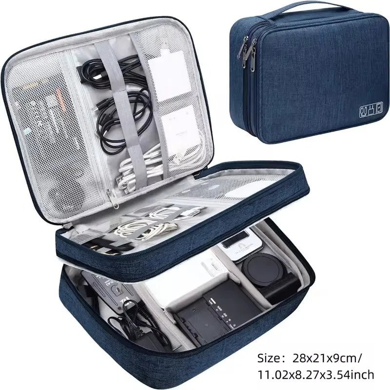 Blue waterproof Oxford fabric electronic organizer bag, open showing cables, chargers, and accessories.
